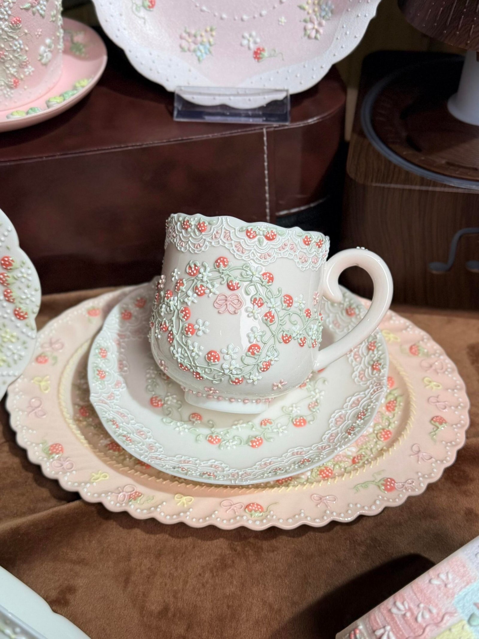 Strawberry wreath ceramic cup and saucer with 3D bow and floral details
