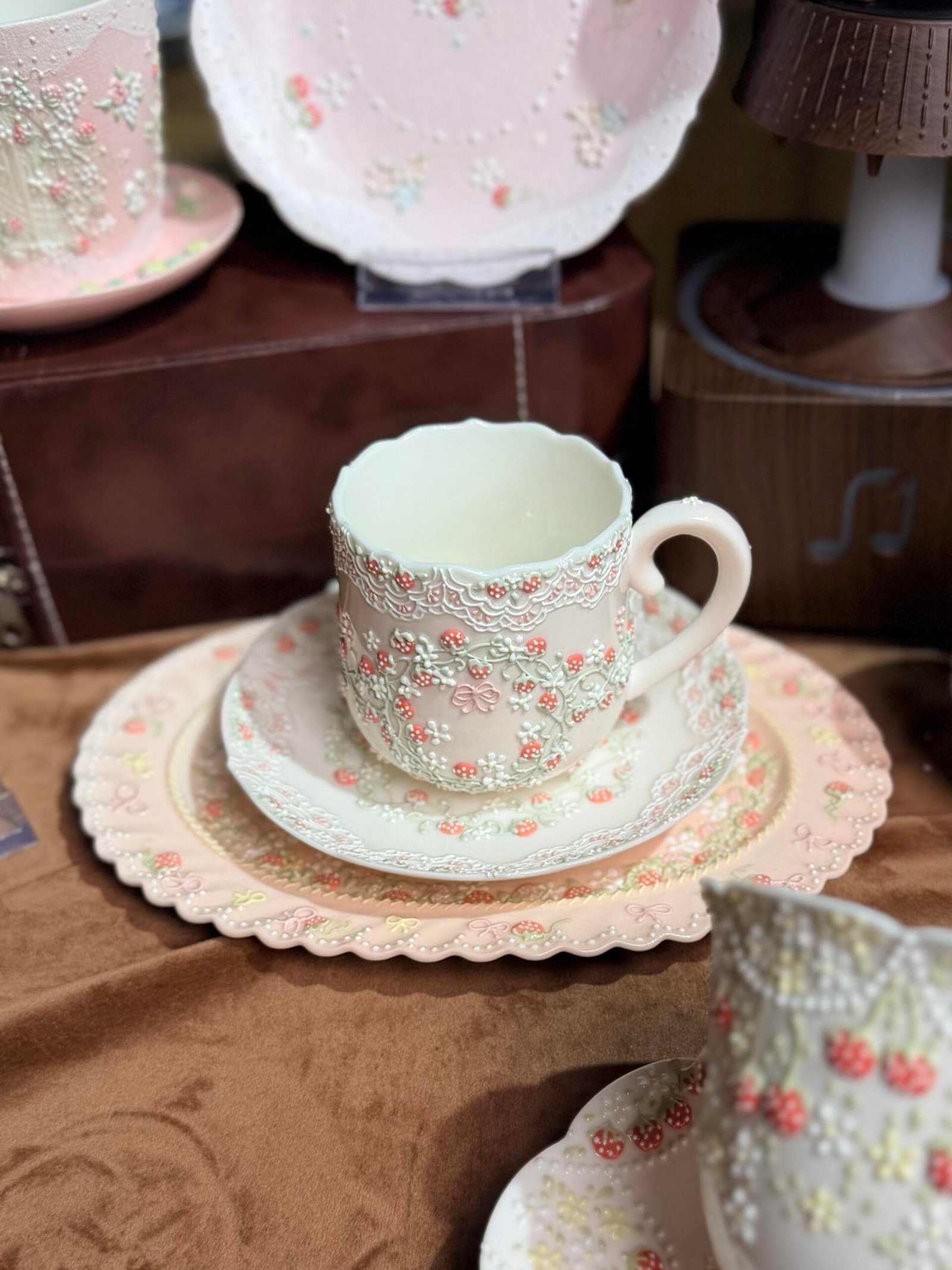 Strawberry wreath ceramic cup and saucer with 3D bow and floral details